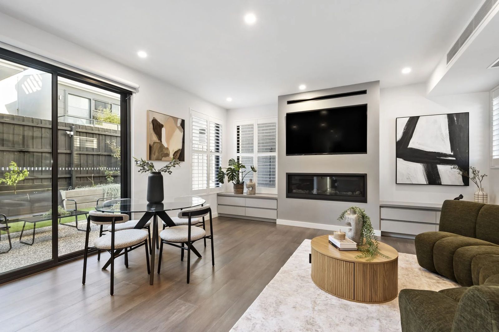 Open plan dining and living area in a Zentos Constructions home